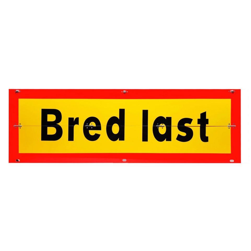 Bred last skylt vikbar