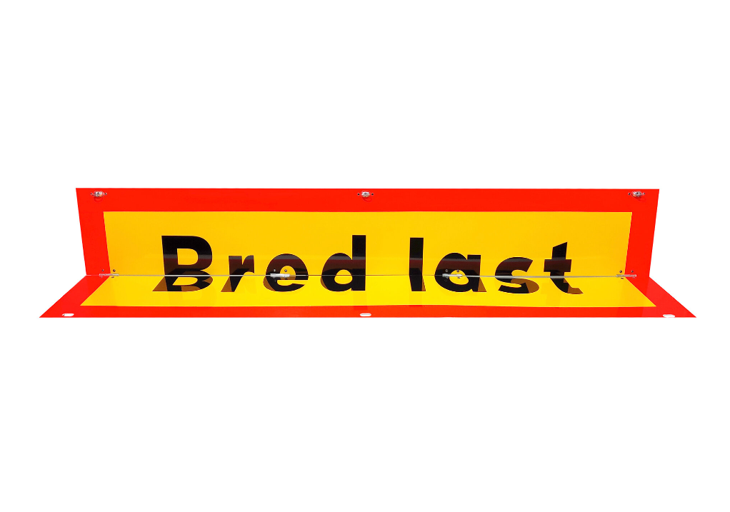 Bred last skylt vikbar